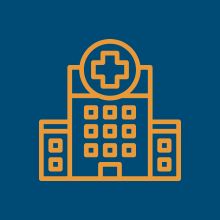 An orange outline icon of a hospital building on a dark blue background